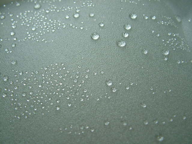 A close up of water droplets on glass